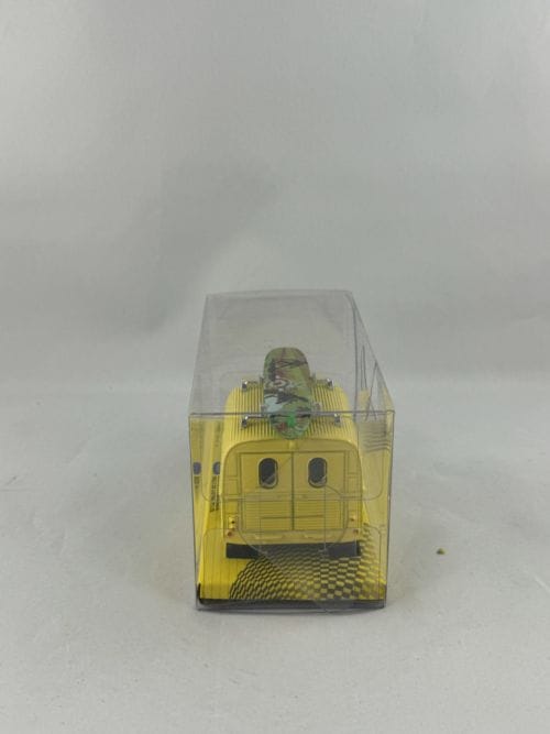 Fourgonnette 2CV Citroën jaune hippie planche de surf verte