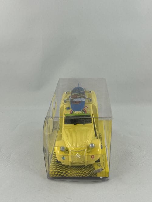 Fourgonnette 2CV Citroën jaune hippie planche de surf bleue