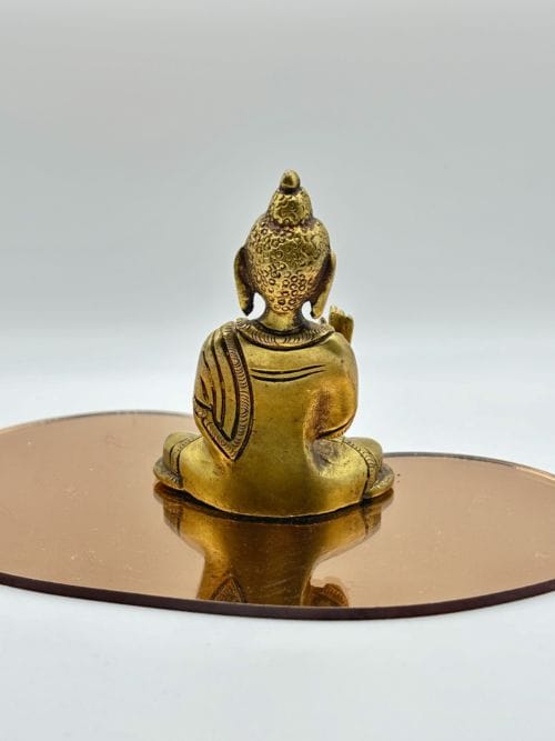 Statuette de Bouddha main levée en méditation