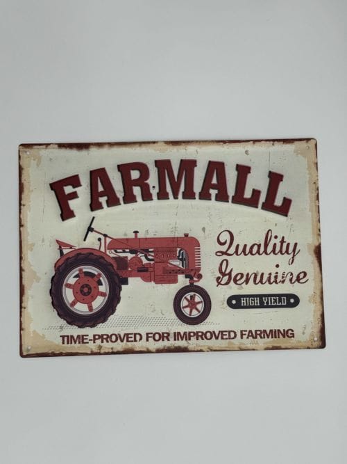 Plaque métal Farmall Quality Genuine
