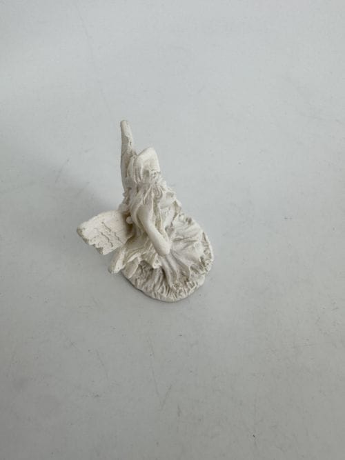 Fée qui se coiffe - dans sa boite